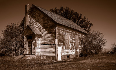 If you are careful as you drive the back roads you can see an old structure that served our educational system in the horse and buggy days. Serveral of the old schools have signs as to the school name, this one didn't.
An image may be purchased at http://edward-peterson.artistwebsites.com/featured/school-days-edward-peterson.html