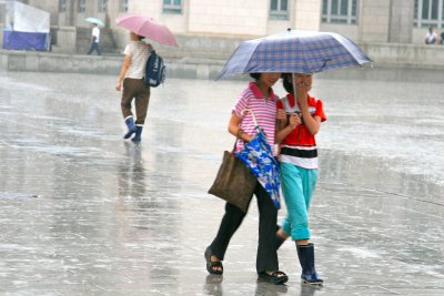Schoolgirls Sharing an Umbrella, P'yongyang