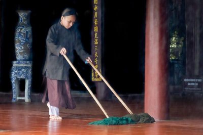 Young Monk Sweeping the Temple Floor