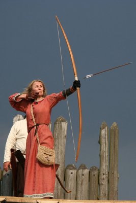 Archer and flying arrow