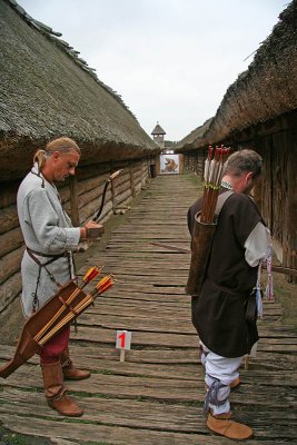 Archers between huts