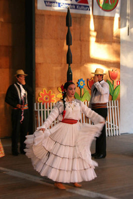 Dancer with four bottles