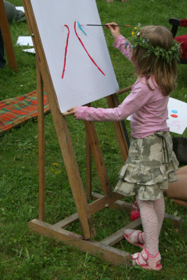 Little girl paints