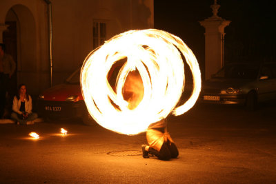 Fire dancer juggling torches