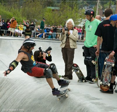 Jason skates while Tony watches