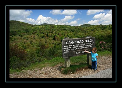 Pointing out the elevation at Graveyard Fields