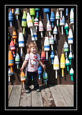 Norah picking out a lobster buoy