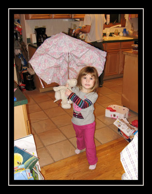 Dancing in the kitchen with Hello Kitty umbrella and Kitty Cat