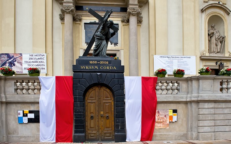 Sculpture With Flags  At Holy Cross Church
