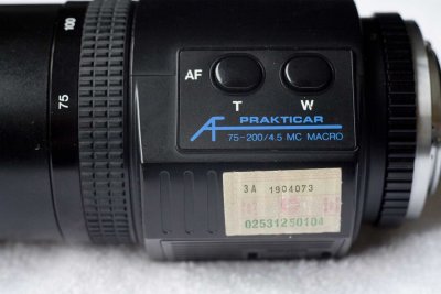 AF and Tele & Wide power zoom button