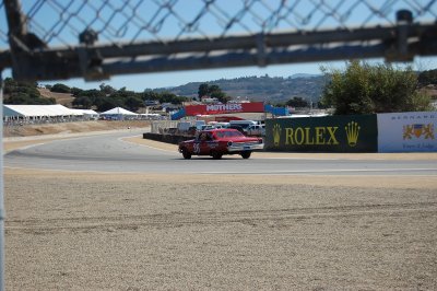 Vintage NASCAR rounding turn #4 at Laguna Seca