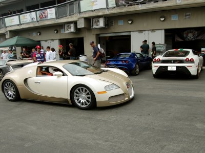 Bugatti Veyron gold with cream and F430 Scuderia