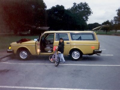 Daughter with 1st bike and family wagon - '78 Volvo 245
