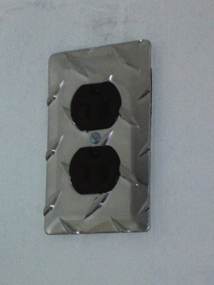 RV makeover with diamond plate aluminum electric jacks