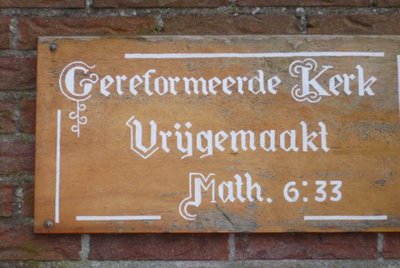 Frieschepalen, geref kerk vrijgem infobord {004], 2009.jpg