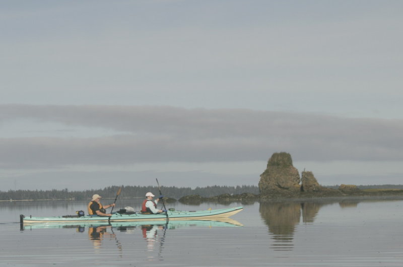 Bruce captured Becky and Dave. paddling past the Rock, headed for the shore adjacent..