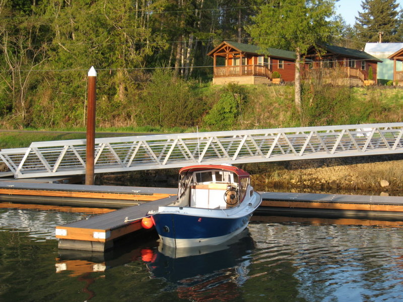 Skookum floats and quick access to the cabins; Surf Scoter in foreground.