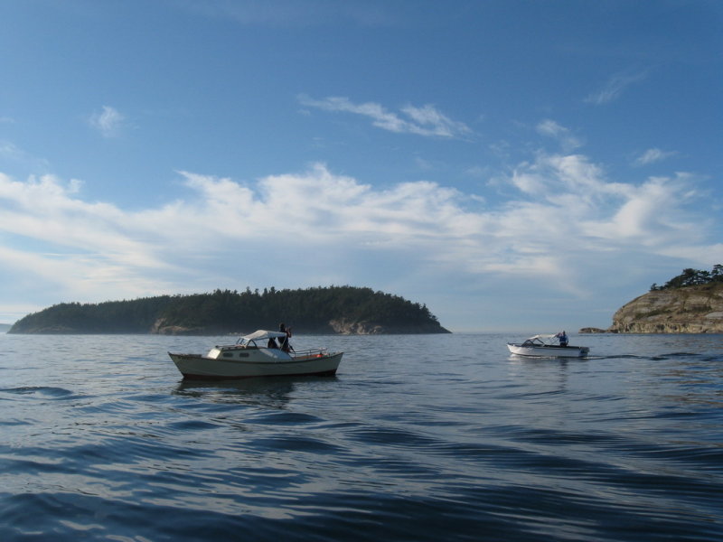 Strait Shot and Stan Johnsons Calkins skiff pause off Matia.