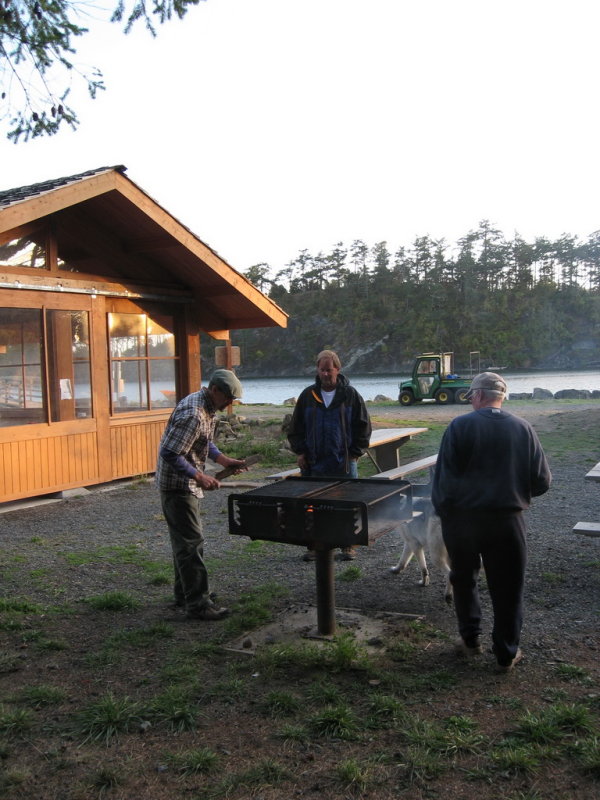 Bartender Bill, stoking the fire for latecomers.