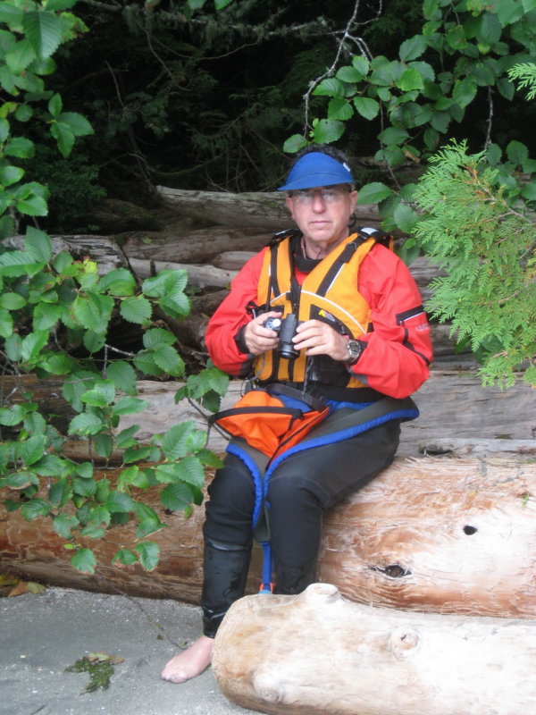 Jan holding down a log, Same cove.