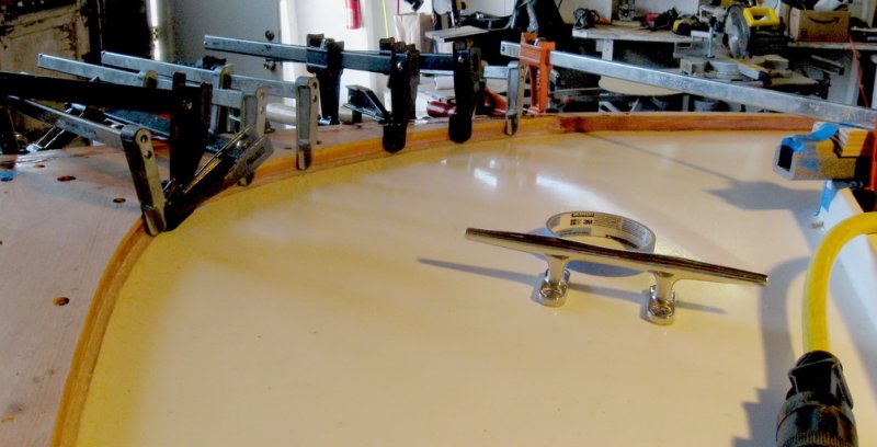 Starboard rail all glued in place.  On to sanding and shaping.