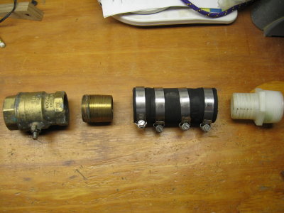 Old one disassembled.  Hose barb is a brass close nipple, one end's threads filed down to accept hose.