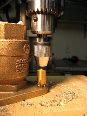 Mounting holes are countersunk to accept flathead woodscrews; extra chuck provides clearance.