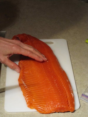 Salmon deboning.