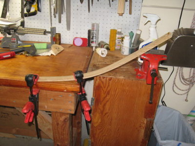 After 20 minutes of steam-up, a small piece of oak spent 10 minutes inside; bent by hand and held in clamps.