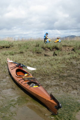 That nice wood boat attracts photos.