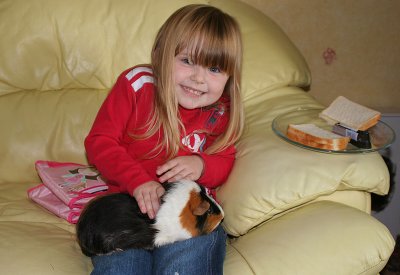 Heather with Squeak the guinea pig.