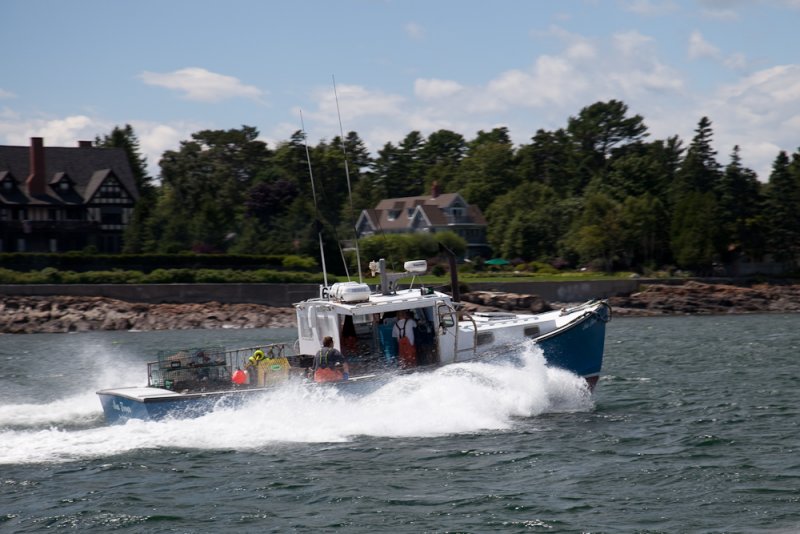 Lobster boat in a hurry