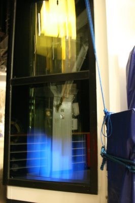 Glass elevator lights at night