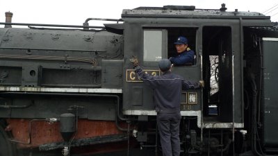 Japanesse steam engine drivers.