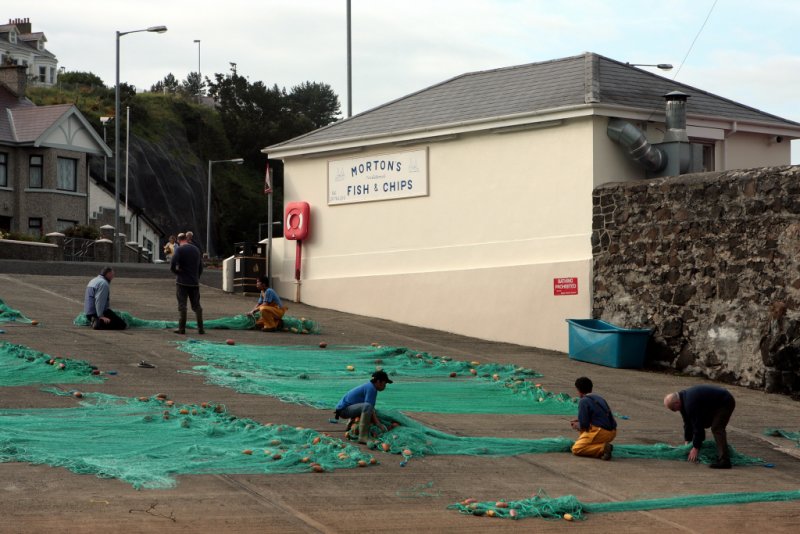 Mending nets outside Mortons