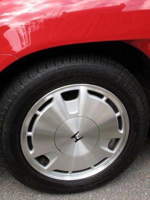 Brushed Alloy wheels, the center cap is plastic