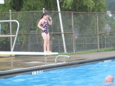 Leila contemplating jumping off the board