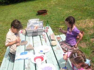 Painting rocks to go around Randy's pool