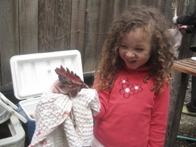 Leila's such a Tom-boy. Yes, that's a severed chicken head.