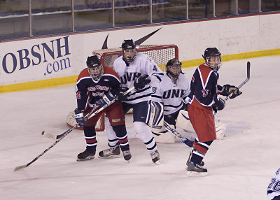 Shawn Glidden and Ricky Stuart in UNH's face.jpg