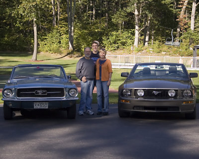 Dad Liz and James and 2 Mustangs.jpg