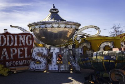 Aladdin's Lamp set among several smaller signs.