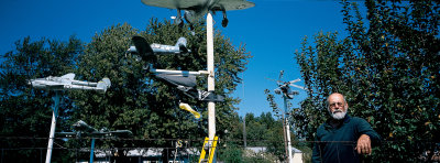 Veteran with hand-made war planes along I-64, Indiana.