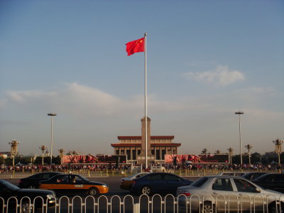 Tiananmen Square with Chairman Mao's Mausoleum tower between the national flag pole and the People's Great Hall