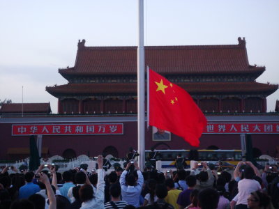 The flag comes down over Chairman Mao