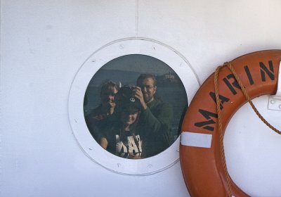 Reflecting on the porthole.