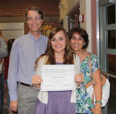 Haley with proud parents.