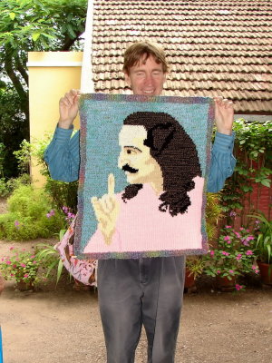 A Knitted painting of Baba