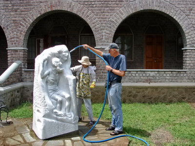 Ted Judson washing Statue