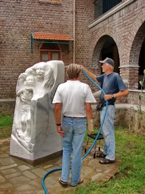 Ted Judson washing Statue